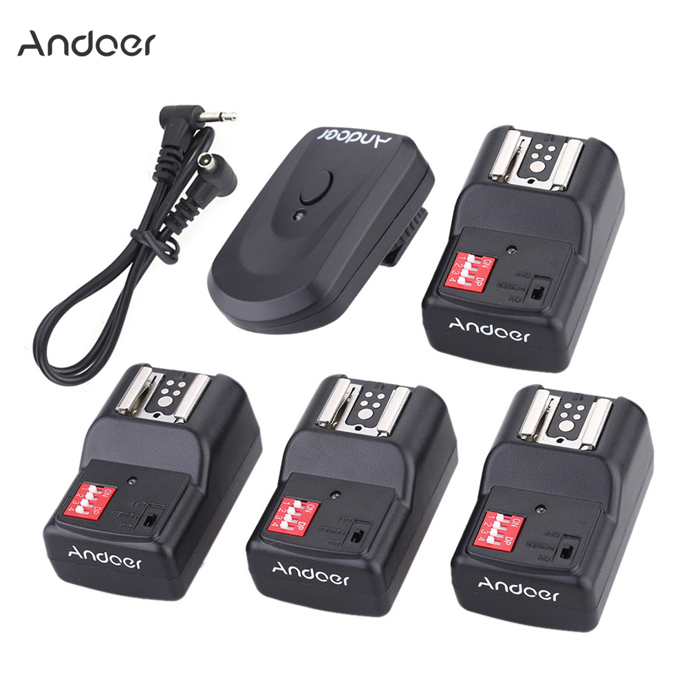 unknown Andoer 16 Channel Wireless Remote Flash Trigger Set 1 Transmitter + 4 Receivers + 1 Sync Cord for Canon Nikon Pentax Olympus Sigma Sunpak Vivitar Neewer YOUNGNUO Speedlite